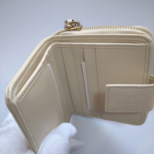 大人気 グッチ 財布 偽物 GG シマ レザー折りたたみ コンパクト財布449395 BMJ1G